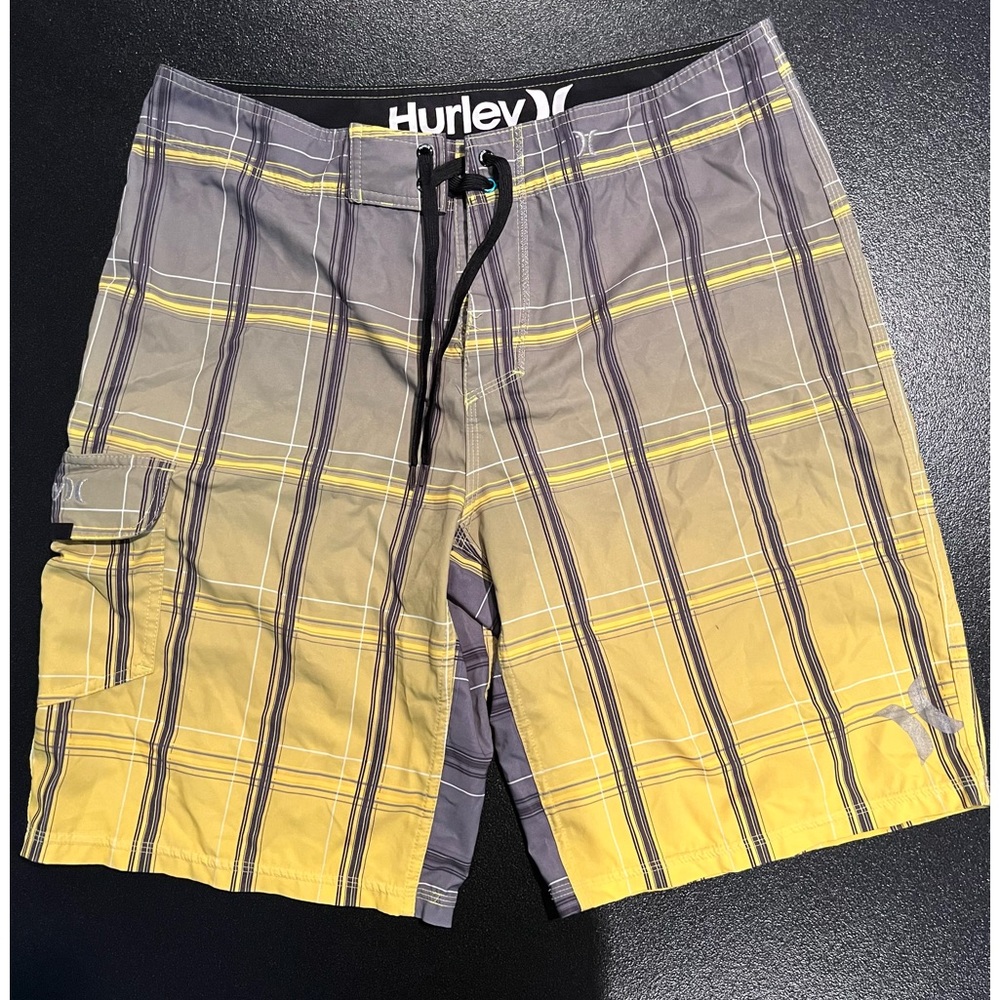 Hurley Board Shorts. Size 34. Plaid with white,  gray and yellow.